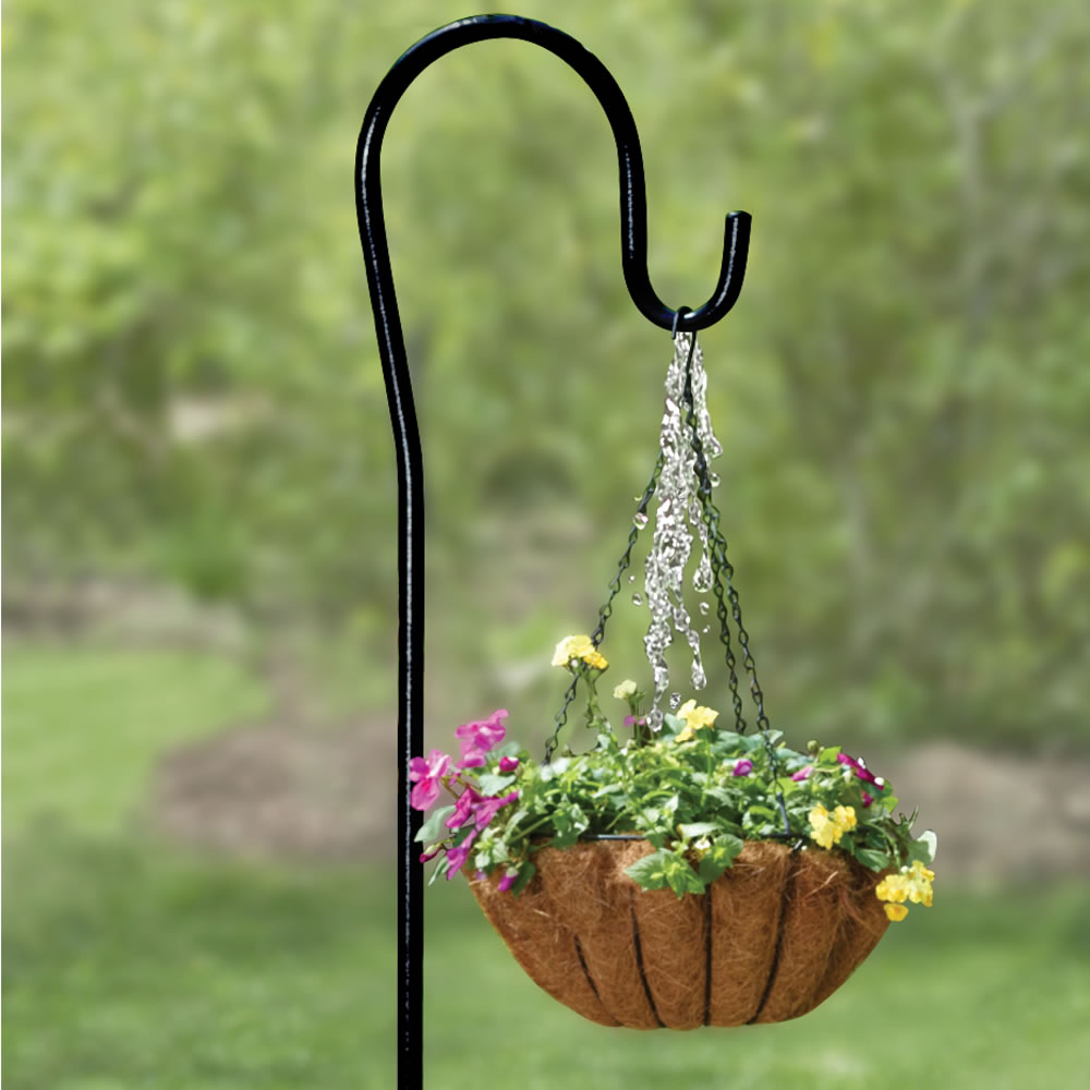 The Self Watering Plant Hanger Hammacher Schlemmer in Garden Plant Hanger Stand