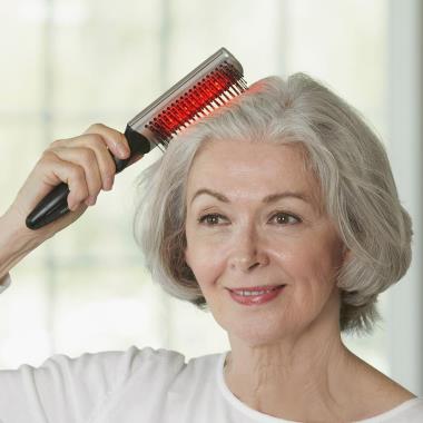 The Scalp Massaging Heated Hair Brush