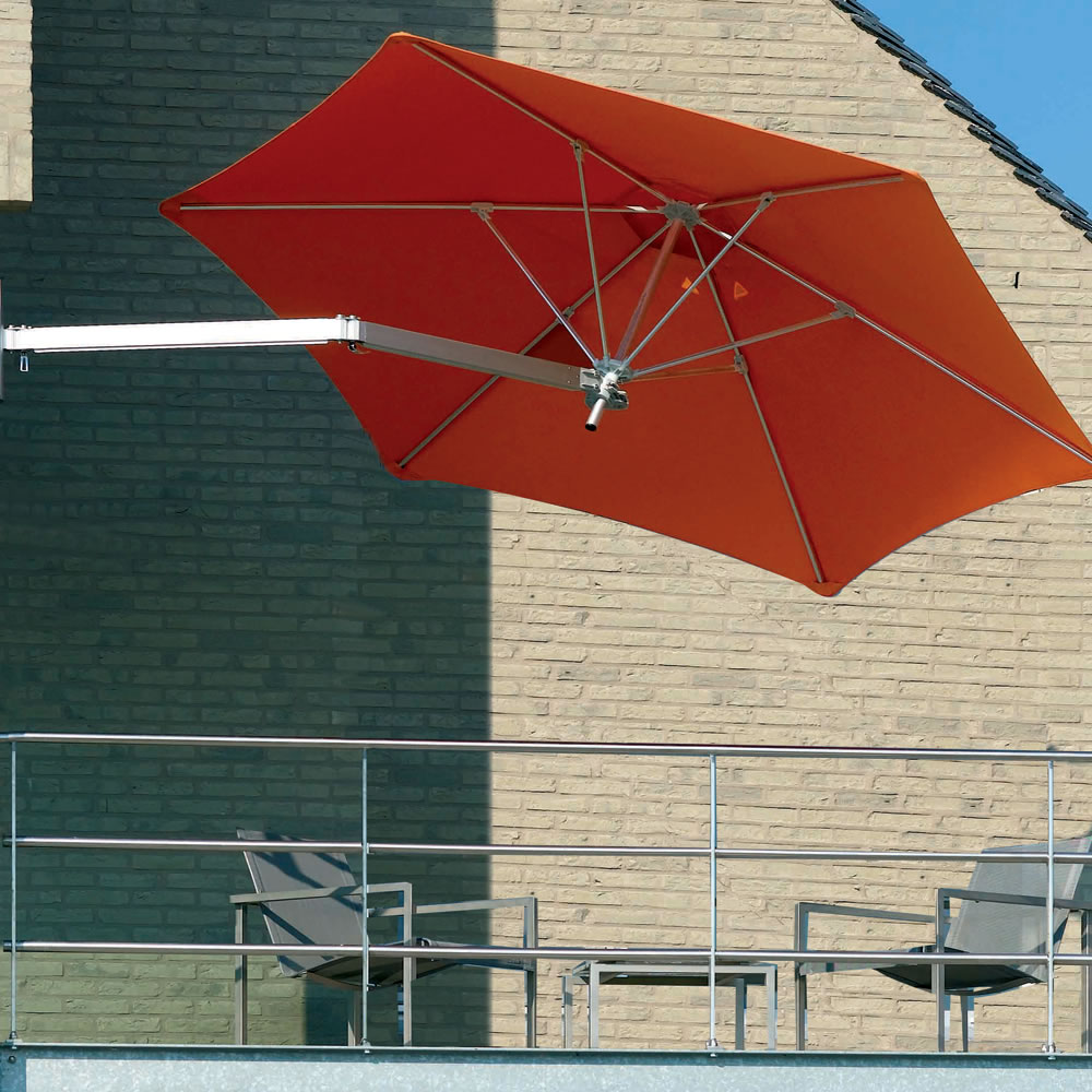 The Wall Mounted Patio Umbrella - Hammacher Schlemmer