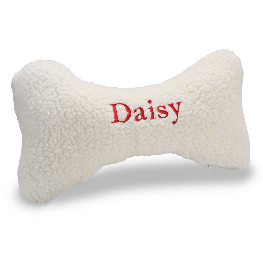 The Personalized Dog Bone Pillow (Medium) Hammacher Schlemmer