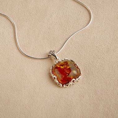 Sold at Auction: Vintage Amber Pendant Necklace