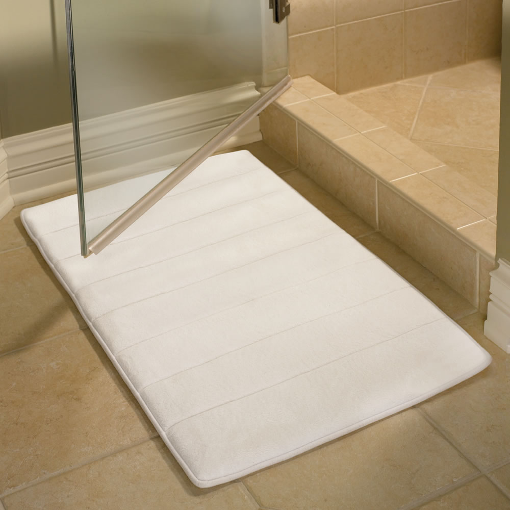 The Water Absorbing Comfort Kitchen Mat - Hammacher Schlemmer