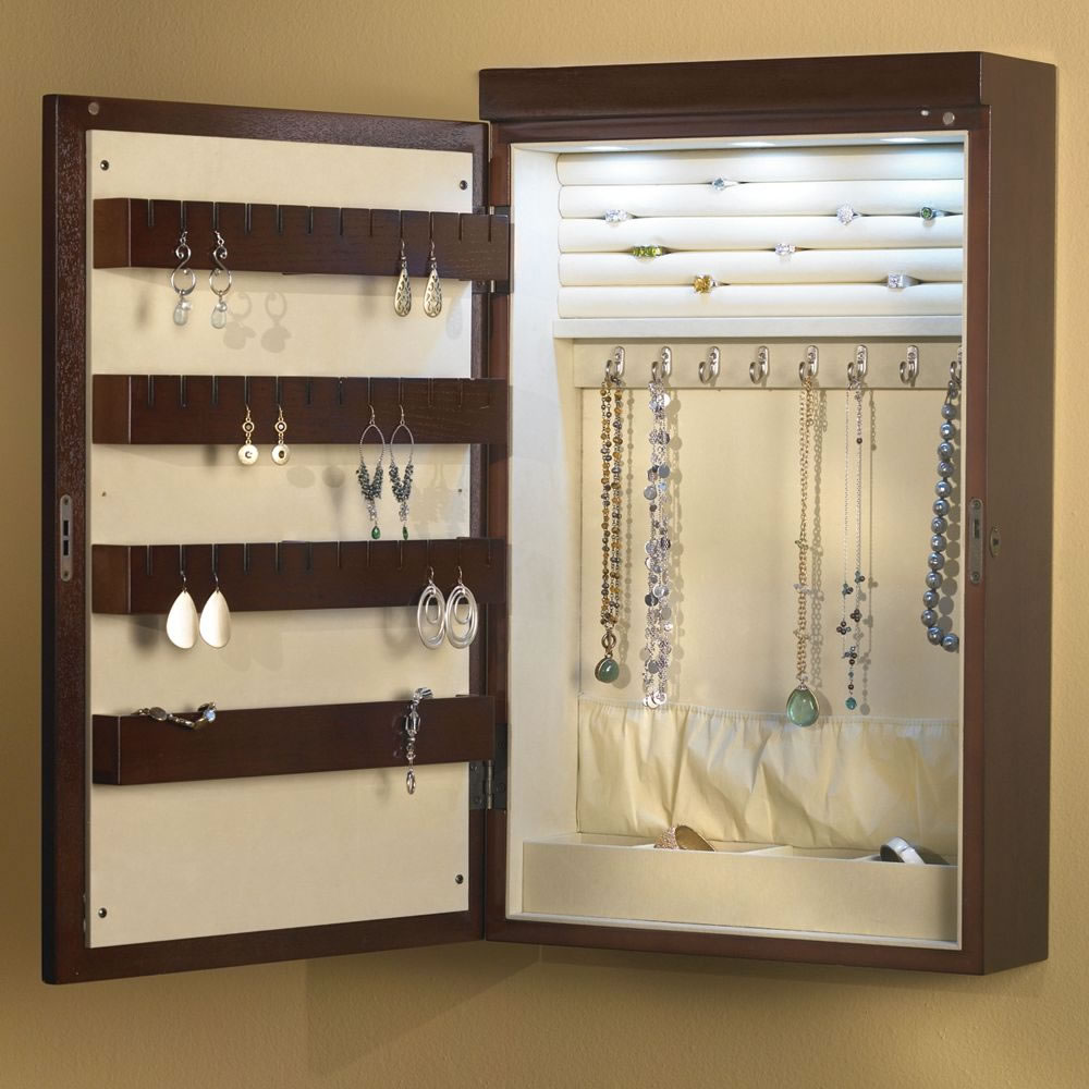 The 24 Wall Mounted Illuminated Jewelry Armoire Hammacher Schlemmer