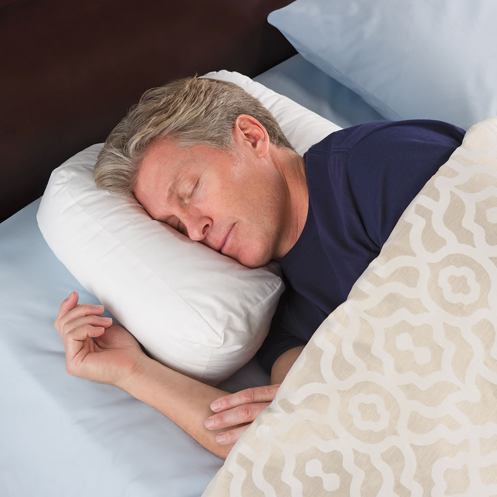 The Ergonomic Side Sleeper Pillow - Hammacher Schlemmer