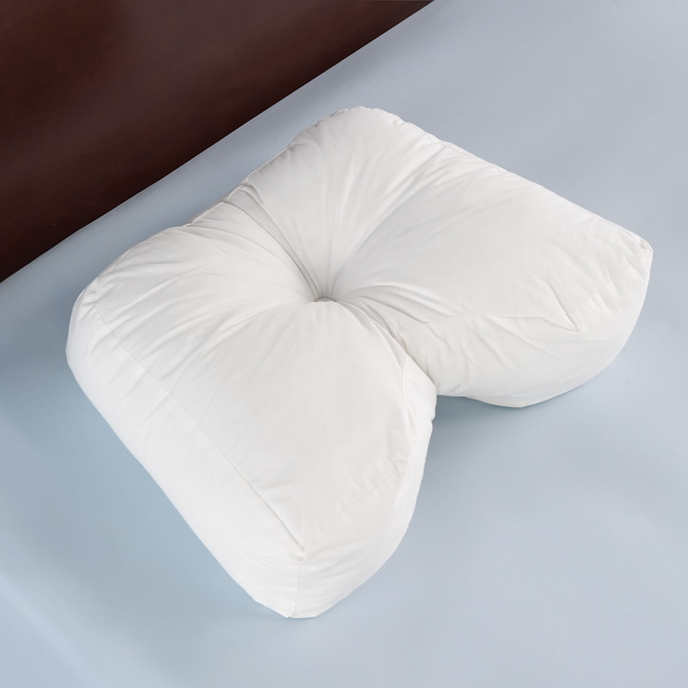 The Ergonomic Side Sleeper Pillow - Hammacher Schlemmer