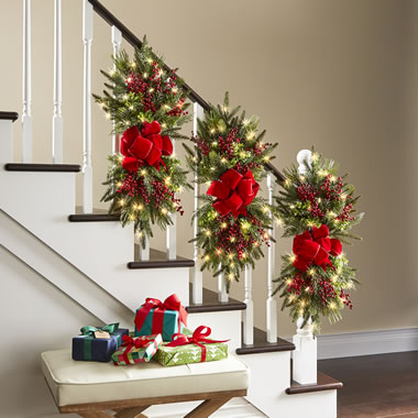 The Cordless Prelit Poinsettia And Ribbon Holiday Trim - Hammacher ...