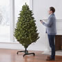 The Remote Controlled Height Adjustable Christmas Tree - Hammacher ...