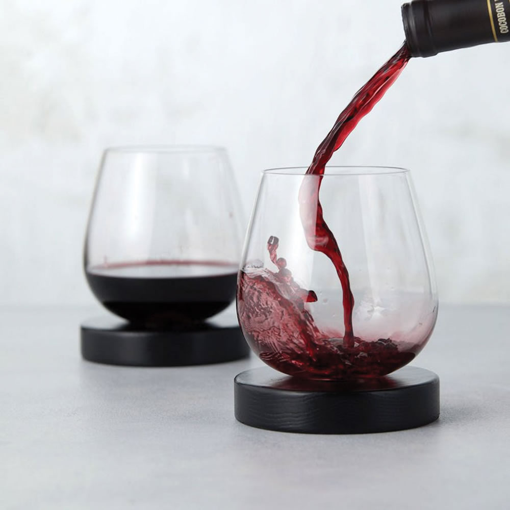 The Rotating Self Aerating Wine Glasses - Hammacher Schlemmer