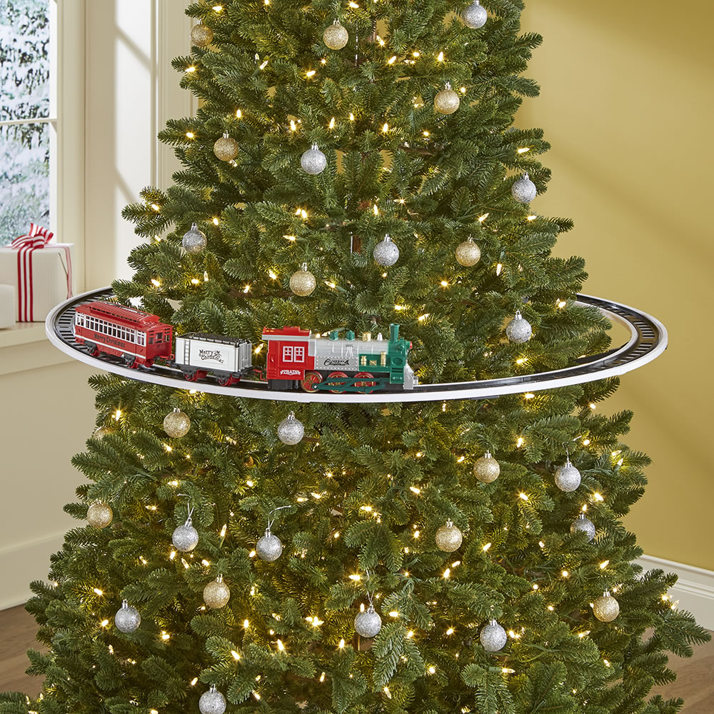 train set around the christmas tree