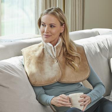 The Massaging Heated Neck and Shoulder Wrap - Hammacher Schlemmer