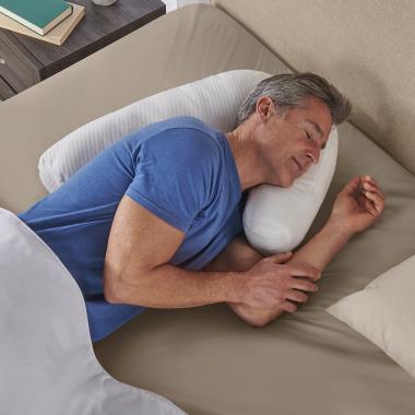 The Back Pain Relieving Lumbar Support Pillow - Hammacher Schlemmer