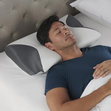 The Ergonomic Side Sleeper Pillow - Hammacher Schlemmer