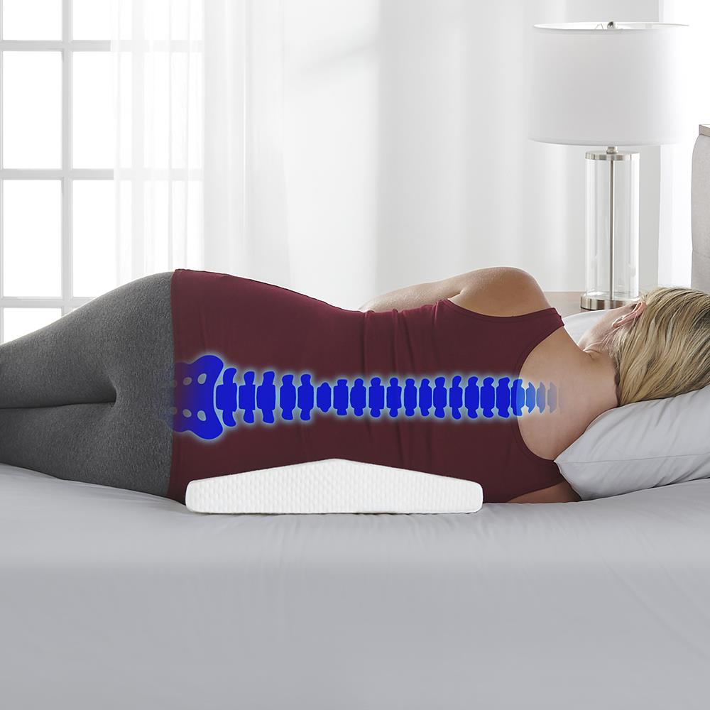 The Back Pain Relieving Lumbar Support Pillow - Hammacher Schlemmer