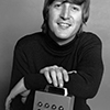 John Lennon holding The Something Box
